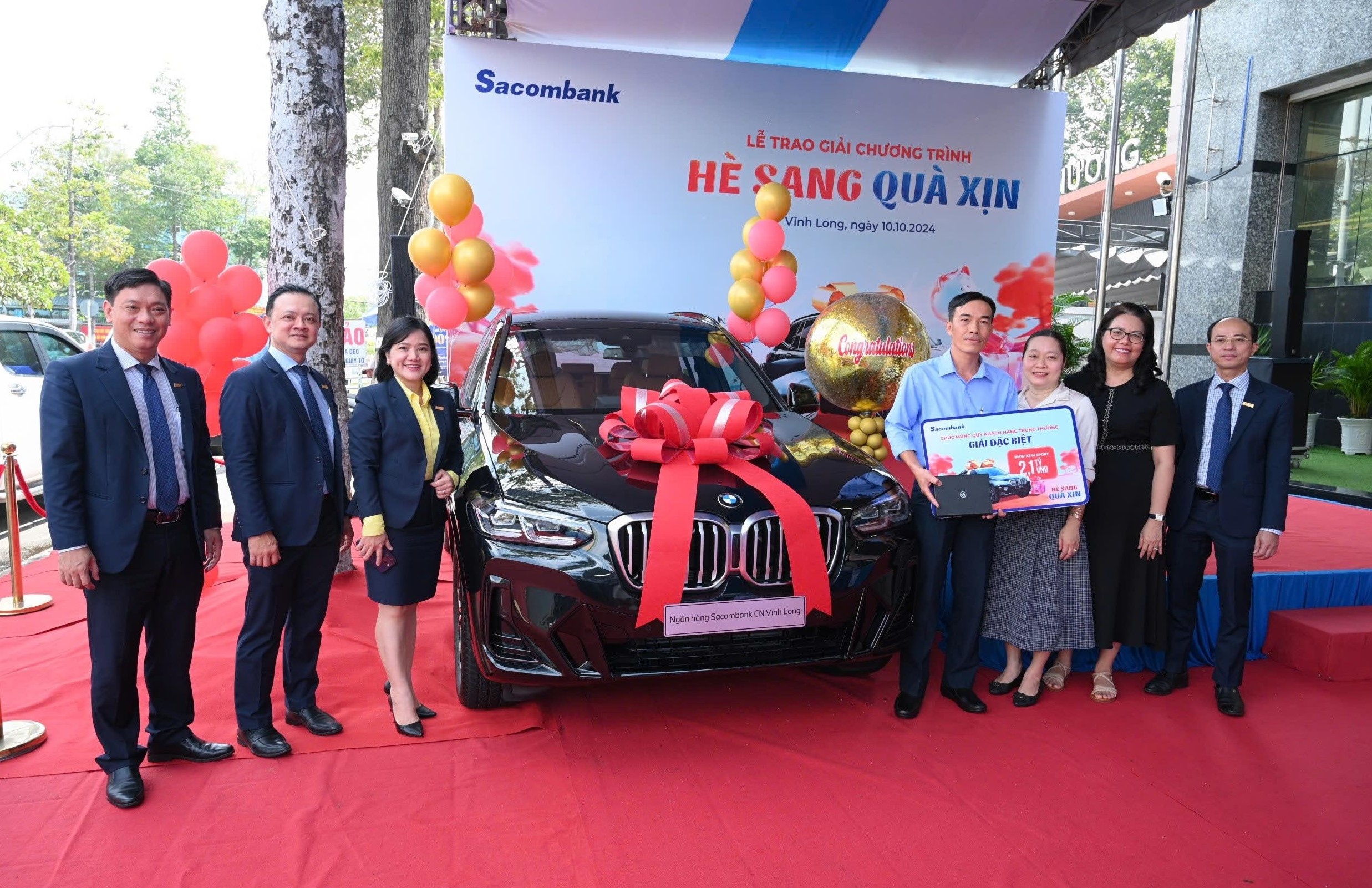 sacombank trao 2 o to bmw hon 4 ty dong den khach hang tai bac lieu vinh long