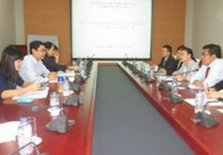 Việt Nam và Lào trao đổi kinh nghiệm về hợp tác quốc tế của NHTW